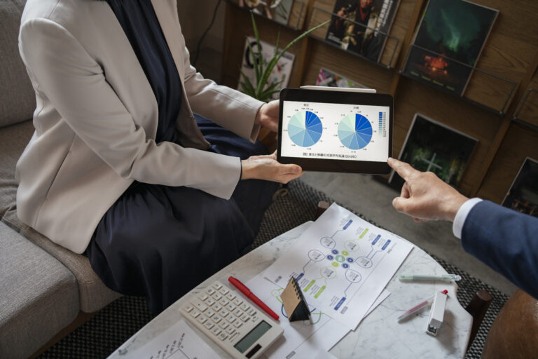 business-people-working-with-ipad-high-angle